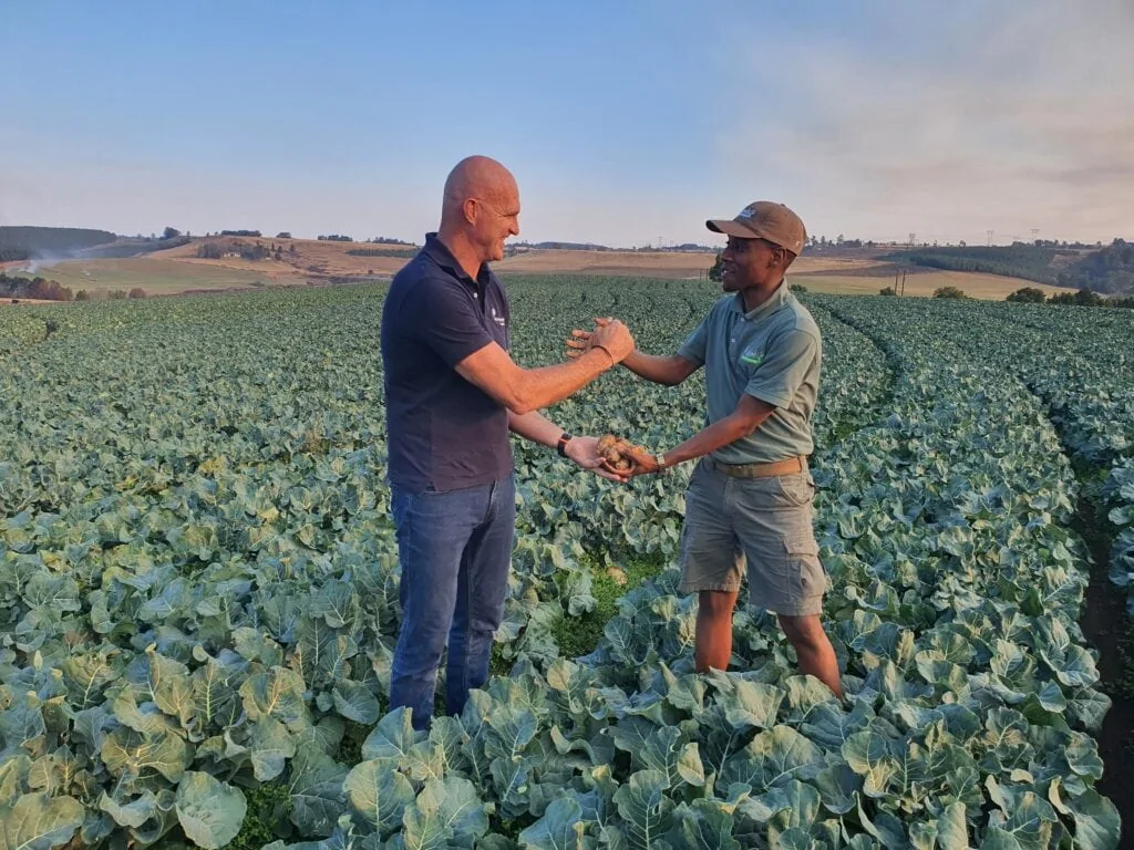 Andre shaking hands